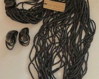  $200   Necklace Gerda Lynggaard Monies multistrand necklace , $50 earrings SOLD.  Necklace: 20"L.  Earrings: 2"L