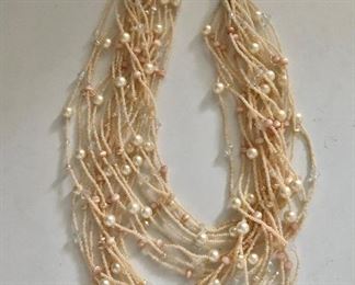 $30 Multi strand pearl beaded necklace.  21"L adjustable. 