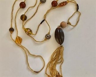 $35 Long beaded tassle necklace.  Necklace: 44"L.  Pendant: 5.75"L 