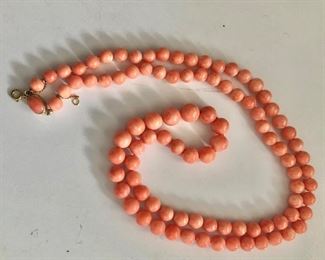 $300 Coral salmon 18K gold clasp extra long necklace.  36"L 