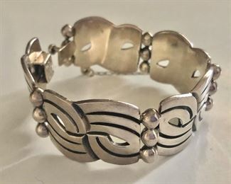 $150 Mexico  925 Sterling silver bracelet.  8"L and 1"W 