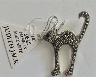 $25  Judith Jack sterling marcasite onyx eye cat pin.  2"L and 1.25"W 