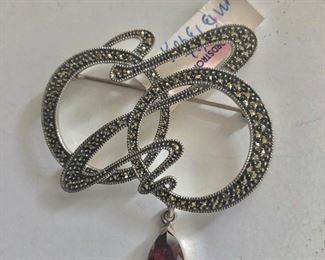$30 Judith Jack swirl pin garnet drop sterling.  2"L and 2.1"W 
