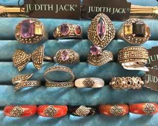 Overview Judith Jack rings TOP  ROW SOLD Row  2 $30 ea Ring 3  Row 3 and 4 $20 ea.  Sizes -  bottom row left to right:  8, 7, 8, 7, 7.  Second row from bottom left to right: 6.5, 8.25/8.25, 8, 6.5.  Second row from the top left to right: 7, 6, 8, 6.  Top row left to right: 8, 8, 7, 8. Band pr rings sold