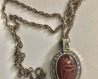$40 Two sided scarab , onyx pendant necklace.  24"L and pendant:  1.6"L and 1"W