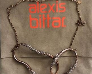 $50 Alexis Bittar irregular shape hoop necklace original pouch included.   16"L and  big hoop: 3"x1.5"; small hoop: 2"x1.25" 