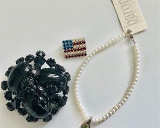 $15ea Black mourning pin SOLD , Baroni pearl peridot bracelet $10 Dorothy Bauer flag pin.   Black pin: 2"Diam