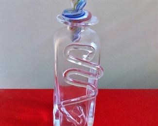 $40 Unique bottle glass blown with stopper.   9.5" H, 2.5" W, 2.5" D. 