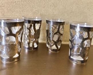$60 Signed sterling silver set of 4 overlay glasses.  Each  2" H, 1.25" diam.
