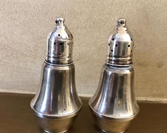 $50 Sterling signed  salt and pepper shakers.  Each  3.5" H, 1.75" diam.