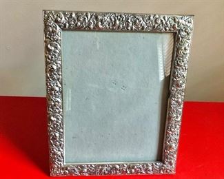 $150 Sterling silver ornate frame.  12" H x 9.5" W.