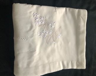 $30 Embroidered flowers cream tablecloth.  104" x 67". 