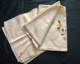 $40  Set embroidered floral tablecloth and 8 napkins.  Tablecloth: 86" x 68"; napkins each 15.5" square. 