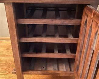 Additional view of end table wine cabinet.