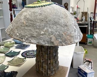 1/2 completed giant ceramic mushroom - we  have the supplies to complete it!