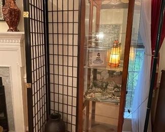 Curio cabinet and lighthouses