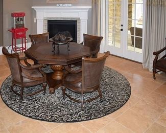 Game table and leather chairs