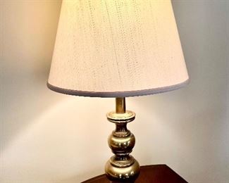 One of many brass lamps 