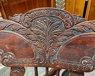 Carving of back of rocker