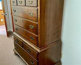 Side view of chest on chest of drawers