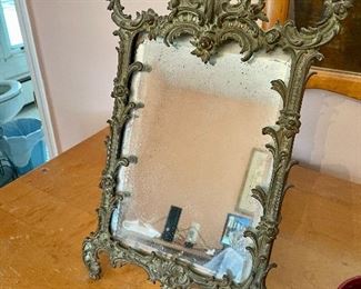 Antique mirror (As is) frame is beautiful the mirror has a chip