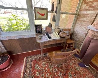 Cow bell wind chimes, primitive table,  side chairs