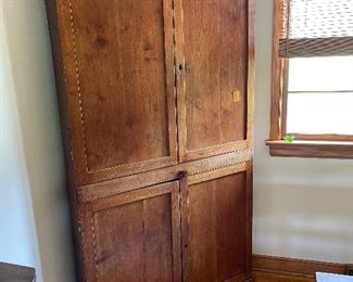 Antique blind door corner cabinet