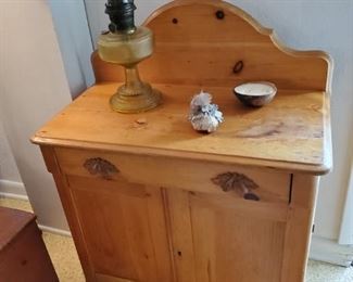Antique stripped pine washstand with foliate pulls