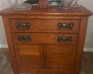 sideboard has four eyes with really long lashes