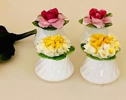 Item 28:  (4) Place card holders, pink & yellow flowers: $48
