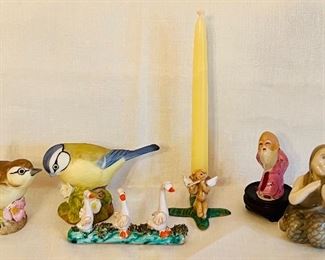 Item 34:  Assorted figurines including angel candlestick holder: $32
