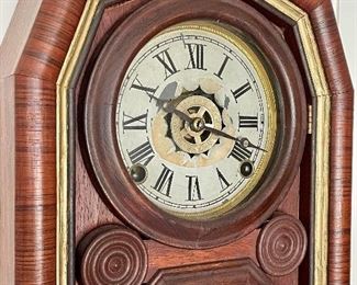 detail - missing a piece of veneer and paint on the bird