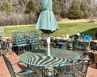 Item 150:  Wrought Iron Table, 4 Armchairs & Umbrella: $295                                                                                                        Table - 48" x 29.5"                                                                                             Armchair - 27.5"l x 17"w x 35.75"h