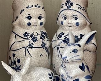 Item 273:  Dedham Pottery Mrs. Jenkins (2), laying rabbit, sitting rabbit:  $50                                                                                                           Tallest - 8"