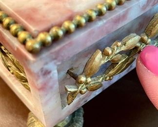 detail - please note the separated piece which can be easily pressed back in