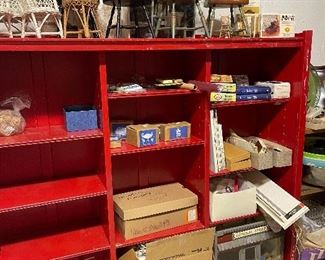 Item 311:  Red storage/bookcase shelving: $65