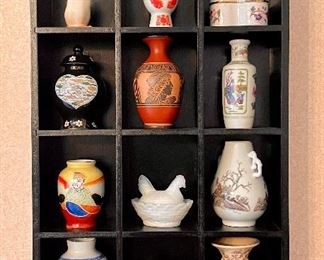Item 317:  Small Shelf with Miniature Porcelain Decorative Pieces: $78