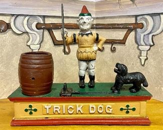 Item 353:  Reproduction Trick Dog Cast Iron Bank: $30