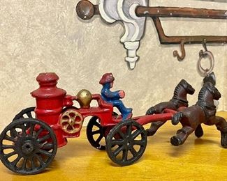 Item 358:  Reproduction Toy -  Fire Guy with Two Horses: $30