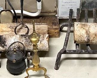 Fireplace items all priced at the sale.