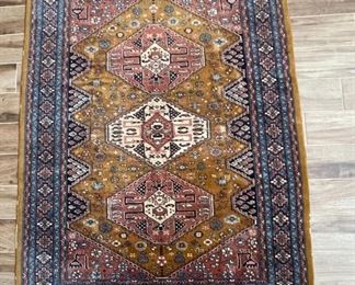 Hand knotted Wool Rug	76 x 51	
