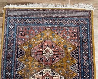 Hand knotted Wool Rug	76 x 51	
