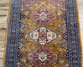 Hand knotted Wool Rug	76 x 51	
