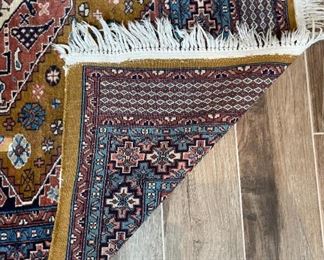 Hand knotted Wool Rug	76 x 51	
