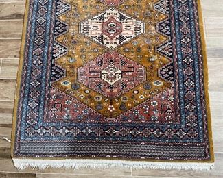 Hand knotted Wool Rug	76 x 51	
