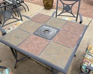Outdoor slate patio table and four chairs	Table 28“ x 39“ x 39“ chair total height 30.75 inches ceiling height 19 inches	
