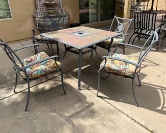 Outdoor slate patio table and four chairs	Table 28“ x 39“ x 39“ chair total height 30.75 inches ceiling height 19 inches	
