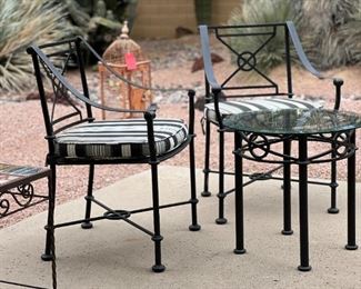 Outdoor wrought iron chairs and table	Table 21.5“ x 22.5“ in diameter chair 34.5“ x 19.5“ 20 inch seating height	
