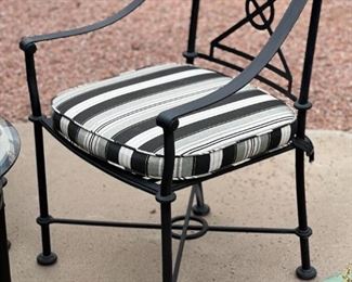 Outdoor wrought iron chairs and table	Table 21.5“ x 22.5“ in diameter chair 34.5“ x 19.5“ 20 inch seating height	
