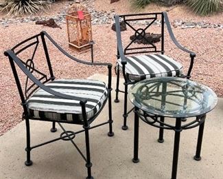 Outdoor wrought iron chairs and table	Table 21.5“ x 22.5“ in diameter chair 34.5“ x 19.5“ 20 inch seating height	
